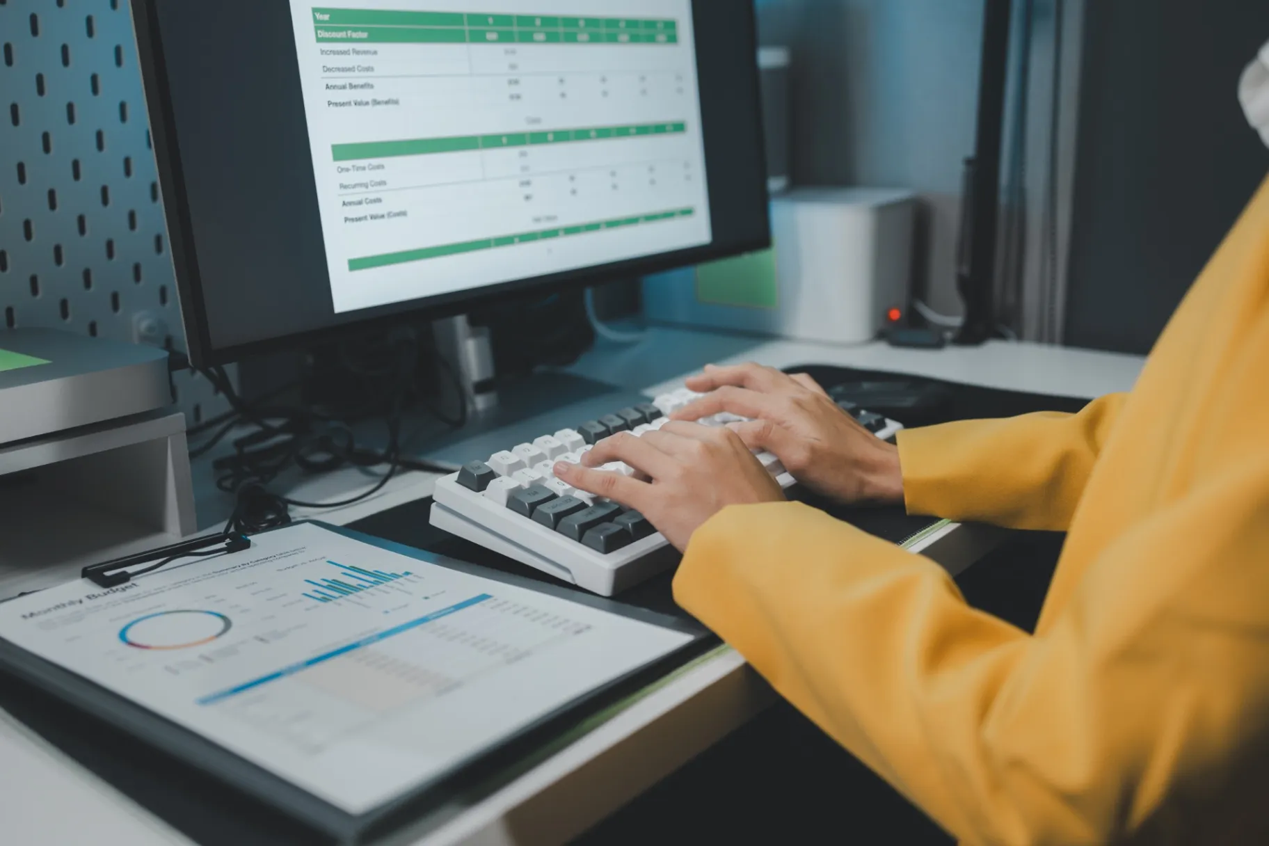 Young woman working on the laptop late at night